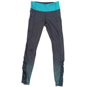 Lululemon leggings sz 4 Speed up lights out black teal eyelet zip pocket trainer